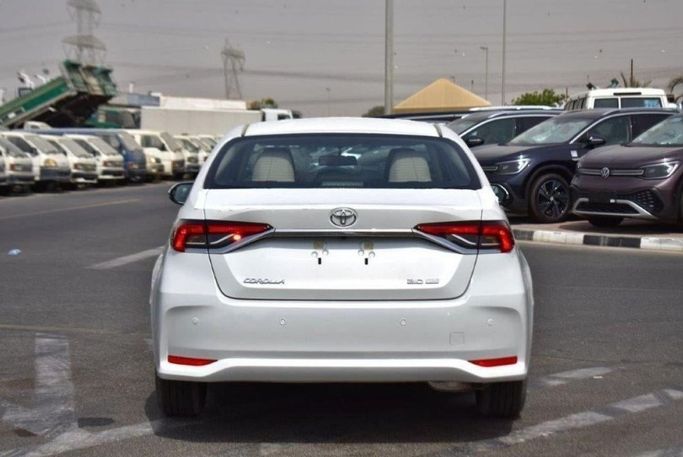 New Toyota Corolla Sporty XII (E210), 2.0 l, 2023 in Dubai by Mohamed Hakim Motors, White color. GCC Specs | AUTO.AE