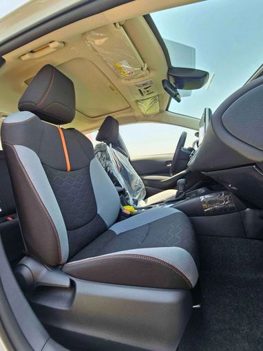 New Toyota Corolla Sporty XII (E210), 1.2 l, 2024 in Dubai by SK Motors, White color. Chinese Specs | AUTO.AE