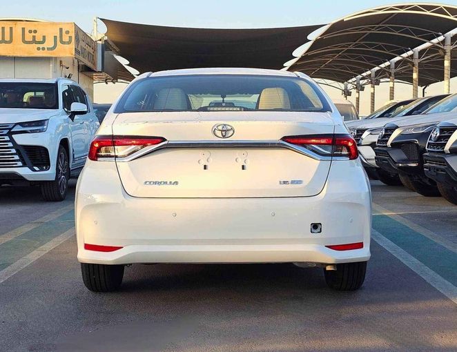 New Toyota Corolla XII (E210), 1.6 l, 2025 in Dubai by SK Motors, White color. GCC Specs | AUTO.AE
