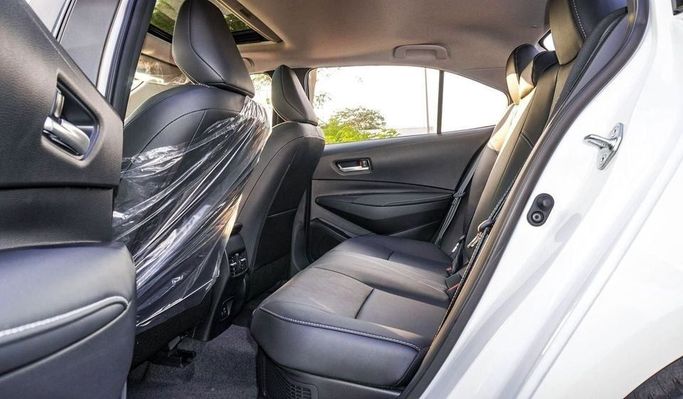 New Toyota Corolla Sporty XII (E210) Facelift, 1.8 l, 2024 in Dubai by Najem Motors, White color. Chinese Specs | AUTO.AE