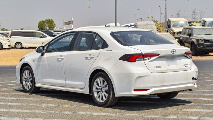 New Toyota Corolla Sporty XII (E210) Facelift, 1.8 l, 2024 in Dubai by Najem Motors, White color. Chinese Specs | AUTO.AE