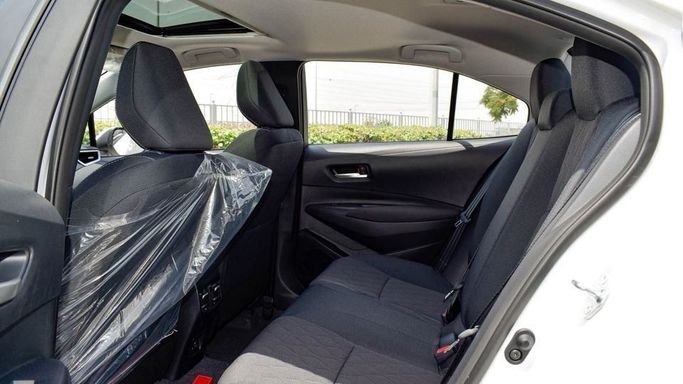 New Toyota Corolla Sporty XII (E210) Facelift, 1.8 l, 2024 in Dubai by Najem Motors, White color. Other | AUTO.AE