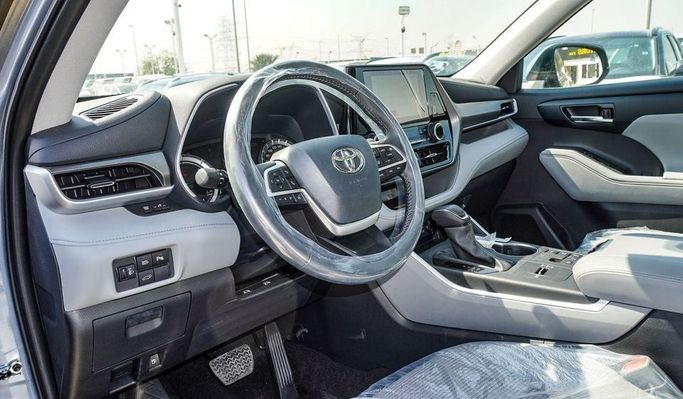 New Toyota Highlander IV (U70), 2.5 l, 2024 in Dubai by Najem Motors, Blue color. GCC Specs | AUTO.AE