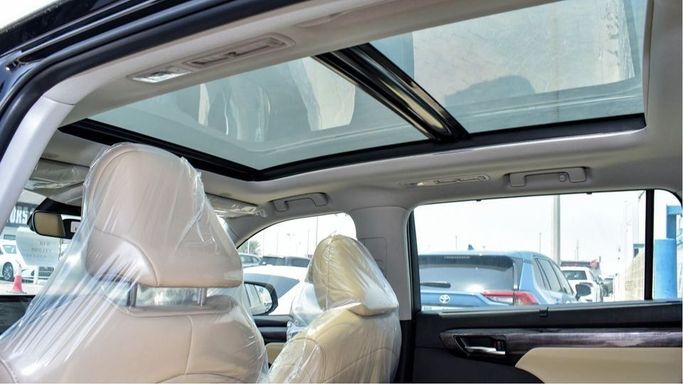 New Toyota Highlander IV (U70), 2.5 l, 2024 in Dubai by Najem Motors, Black color. GCC Specs | AUTO.AE