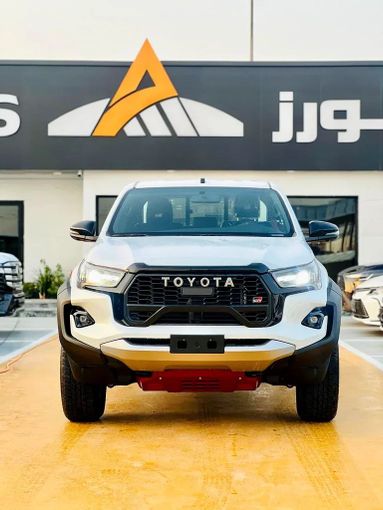 New Toyota Hilux VIII Facelift, 4.0 l, 2025 in Dubai by ANDIAMO MOTORS FZE, White color. GCC Specs | AUTO.AE