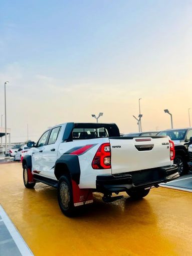New Toyota Hilux VIII Facelift, 4.0 l, 2025 in Dubai by ANDIAMO MOTORS FZE, White color. GCC Specs | AUTO.AE