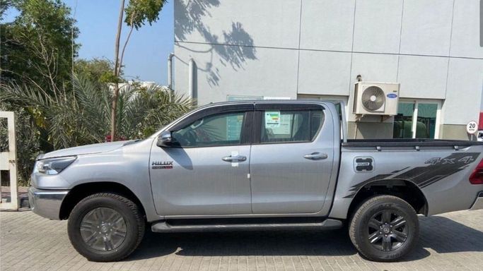 New Toyota Hilux VIII Facelift, 2.7 l, 2023 in Dubai by Mohamed Hakim Motors, Silver color. GCC Specs | AUTO.AE