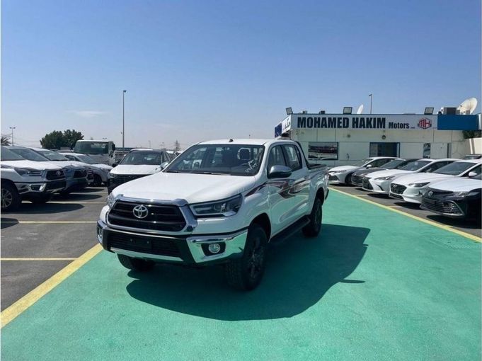 New Toyota Hilux VIII Facelift, 2.7 l, 2024 in Dubai by Mohamed Hakim Motors, White color. GCC Specs | AUTO.AE