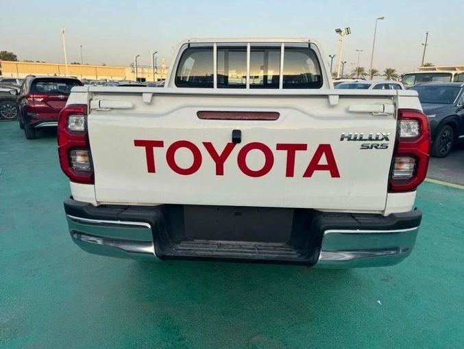 New Toyota Hilux VIII Facelift, 2.4 l, 2025 in Dubai by Mohamed Hakim Motors, White color. GCC Specs | AUTO.AE