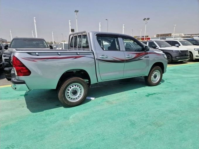 New Toyota Hilux VIII Facelift, 2.4 l, 2023 in Dubai by Mohamed Hakim Motors, Silver color. GCC Specs | AUTO.AE