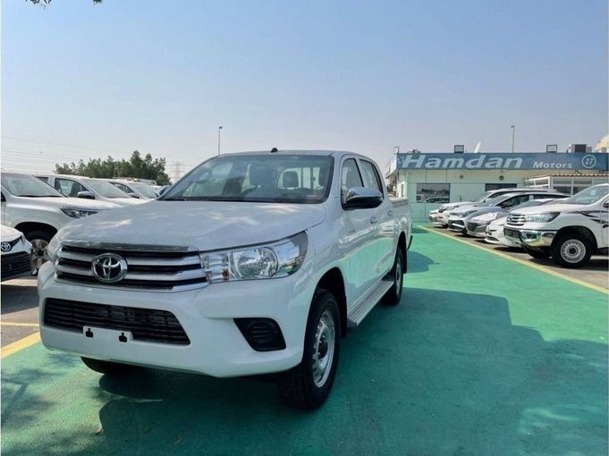 New Toyota Hilux VIII Facelift, 2.7 l, 2024 in Dubai by Mohamed Hakim Motors, White color. GCC Specs | AUTO.AE