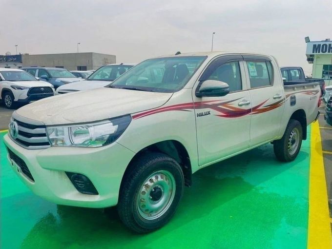 New Toyota Hilux VIII Facelift, 2.7 l, 2024 in Dubai by Mohamed Hakim Motors, White color. GCC Specs | AUTO.AE
