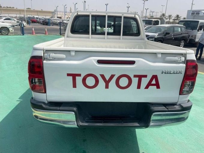 New Toyota Hilux VIII Facelift, 2.7 l, 2023 in Dubai by Mohamed Hakim Motors, White color. GCC Specs | AUTO.AE