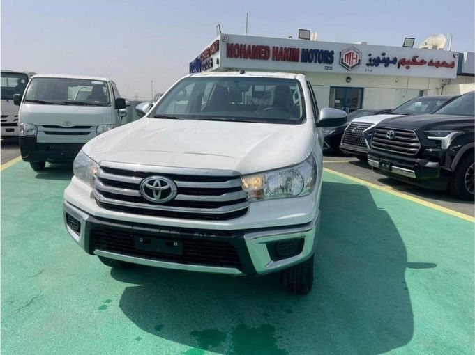 New Toyota Hilux VIII Facelift, 2.4 l, 2023 in Dubai by Mohamed Hakim Motors, White color. GCC Specs | AUTO.AE