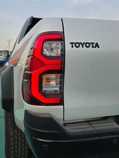 New Toyota Hilux VIII Facelift, 4.0 l, 2025 in Dubai by Mohamed Hakim Motors, White color. GCC Specs | AUTO.AE