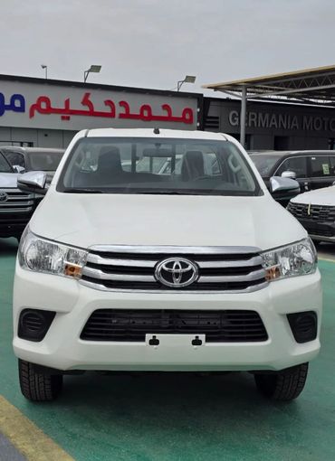 New Toyota Hilux Extra Cab VIII Facelift, 2.4 l, 2025 in Dubai by Mohamed Hakim Motors, White color. GCC Specs | AUTO.AE
