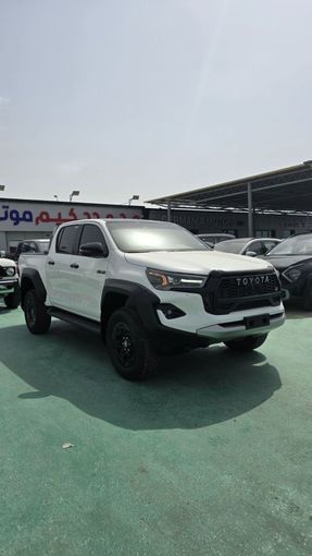 New Toyota Hilux VIII Facelift, 2.8 l, 2025 in Dubai by Mohamed Hakim Motors, White color. GCC Specs | AUTO.AE