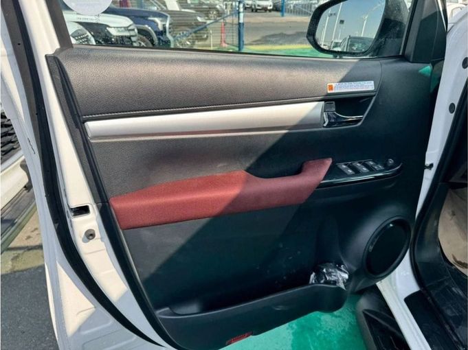 New Toyota Hilux VIII Facelift 2, 2.4 l, 2025 in Dubai by Mohamed Hakim Motors, White color. GCC Specs | AUTO.AE