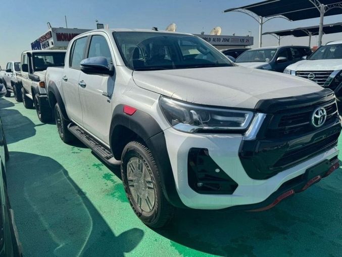 New Toyota Hilux VIII Facelift, 4.0 l, 2025 in Dubai by Mohamed Hakim Motors, White color. GCC Specs | AUTO.AE