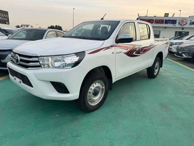 New Toyota Hilux VIII Facelift, 2.7 l, 2023 in Dubai by Mohamed Hakim Motors, White color. GCC Specs | AUTO.AE