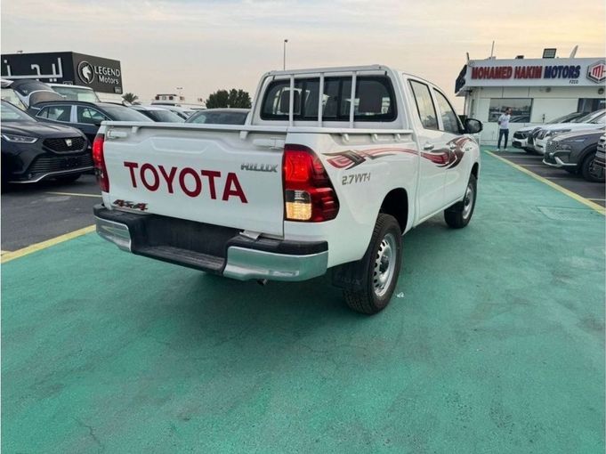 New Toyota Hilux VIII Facelift, 2.7 l, 2023 in Dubai by Mohamed Hakim Motors, White color. GCC Specs | AUTO.AE