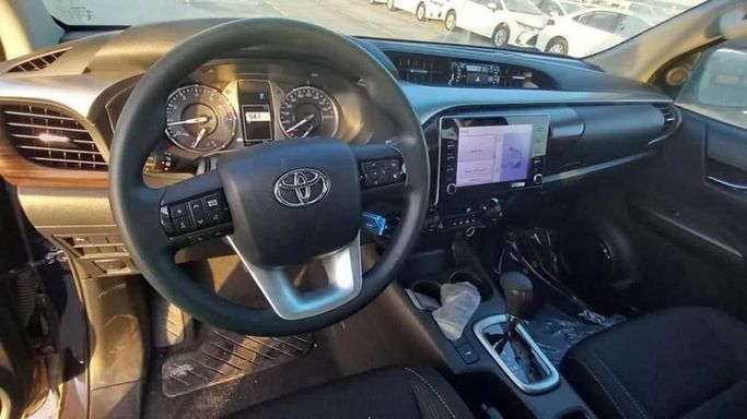 New Toyota Hilux VIII Facelift, 2.4 l, 2023 in Dubai by Mohamed Hakim Motors, Navy Blue color. GCC Specs | AUTO.AE