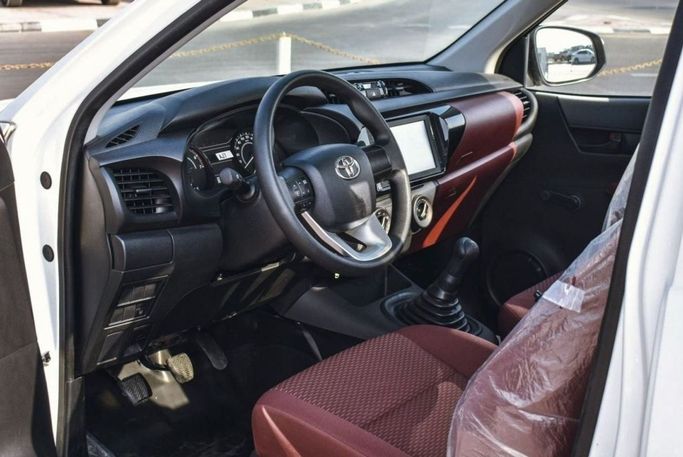New Toyota Hilux VIII Facelift, 2.7 l, 2021 in Dubai by Mohamed Hakim Motors, White color. GCC Specs | AUTO.AE