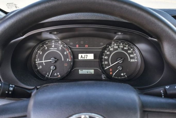 New Toyota Hilux VIII Facelift, 2.7 l, 2021 in Dubai by Mohamed Hakim Motors, White color. GCC Specs | AUTO.AE