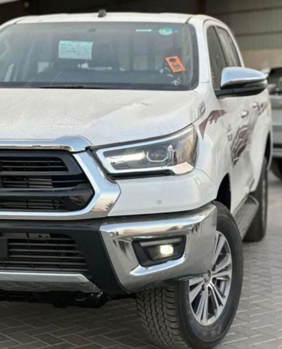 New Toyota Hilux VIII Facelift 2, 2.4 l, 2024 in Dubai by Mohamed Hakim Motors, White color. GCC Specs | AUTO.AE