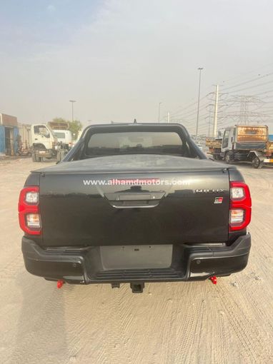 Подержанный Toyota Hilux VIII Рестайлинг 2, 2.8 л, 2024 в Дубае от Alhamd Motors Черный цвет. Other | AUTO.AE