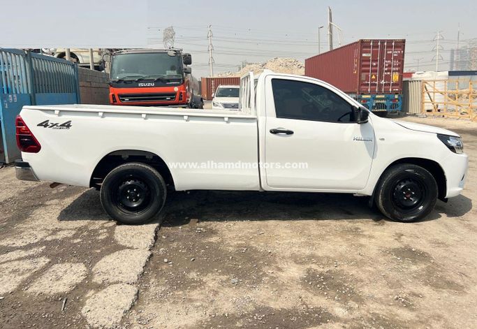 Used Toyota Hilux Extra Cab VIII Facelift, 2.4 l, 2023 in Dubai by Alhamd Motors, White color. Other | AUTO.AE