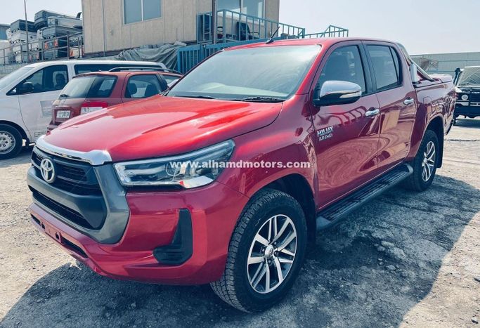 Подержанный Toyota Hilux VIII, 2.4 л, 2016 в Дубае от Alhamd Motors Красный цвет. Other | AUTO.AE