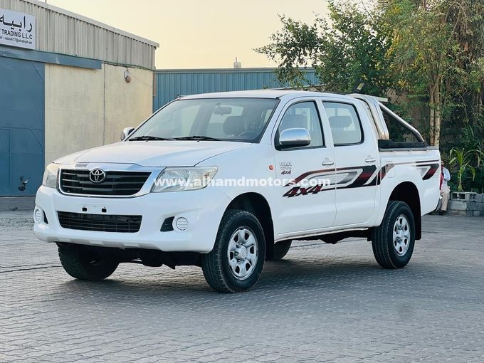 Подержанный Toyota Hilux VII Рестайлинг, 2.7 л, 2012 в Дубае от Alhamd Motors Белый цвет. GCC | AUTO.AE