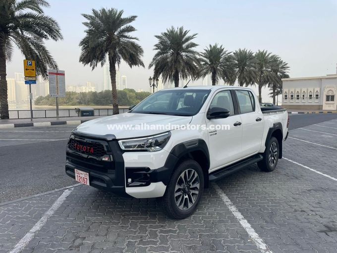 Used Toyota Hilux VIII Facelift, 2.4 l, 2021 in Dubai by Alhamd Motors, White color. Other | AUTO.AE