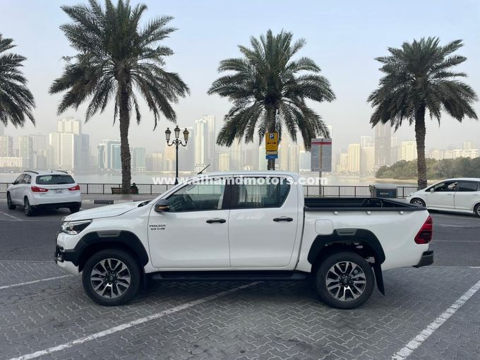 Used Toyota Hilux VIII Facelift, 2.4 l, 2021 in Dubai by Alhamd Motors, White color. Other | AUTO.AE