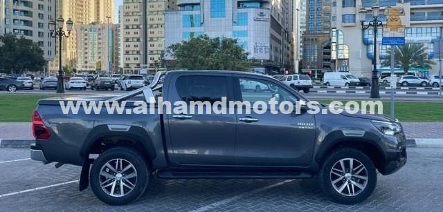 Used Toyota Hilux VIII, 2.8 l, 2018 in Dubai by Alhamd Motors, Grey color. Other | AUTO.AE