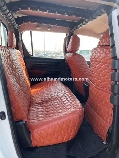 Подержанный Toyota Hilux VIII Рестайлинг, 2.4 л, 2021 в Дубае от Alhamd Motors Белый цвет. GCC | AUTO.AE