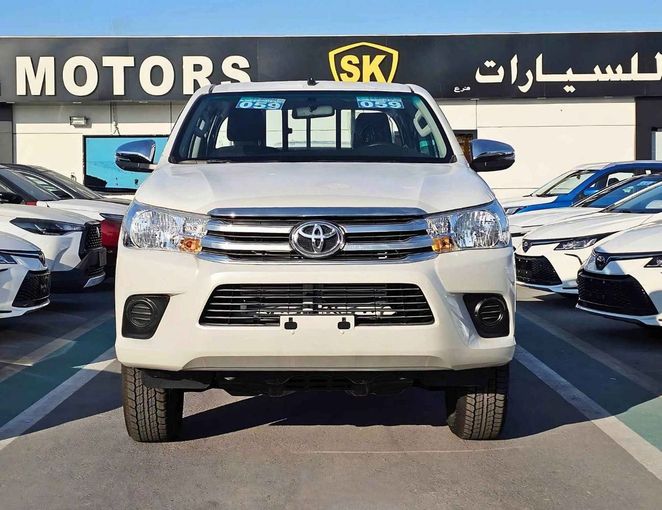 New Toyota Hilux VIII Facelift 2, 2.4 l, 2025 in Dubai by SK Motors, White color. GCC Specs | AUTO.AE