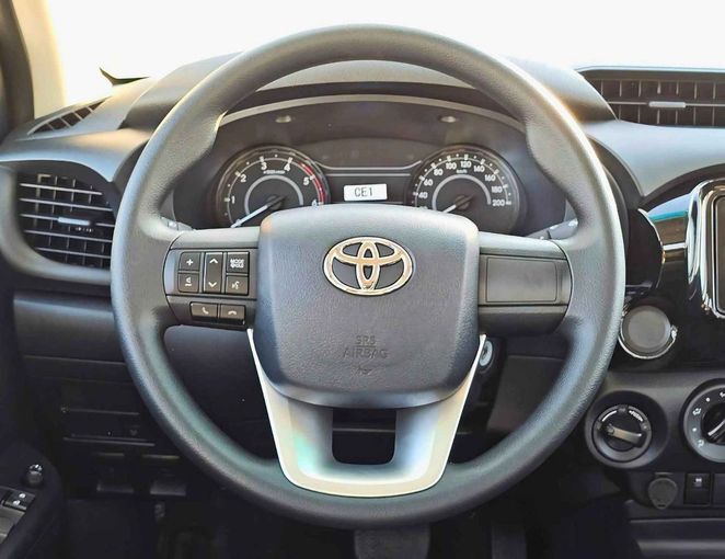 New Toyota Hilux VIII Facelift 2, 2.4 l, 2025 in Dubai by SK Motors, White color. GCC Specs | AUTO.AE