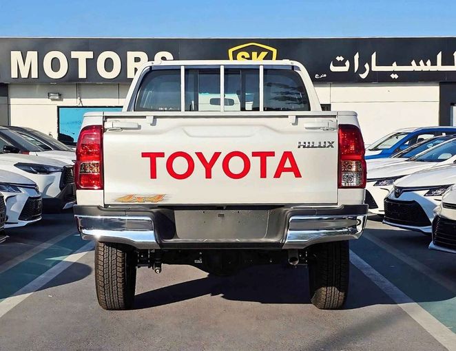New Toyota Hilux VIII Facelift 2, 2.4 l, 2025 in Dubai by SK Motors, White color. GCC Specs | AUTO.AE