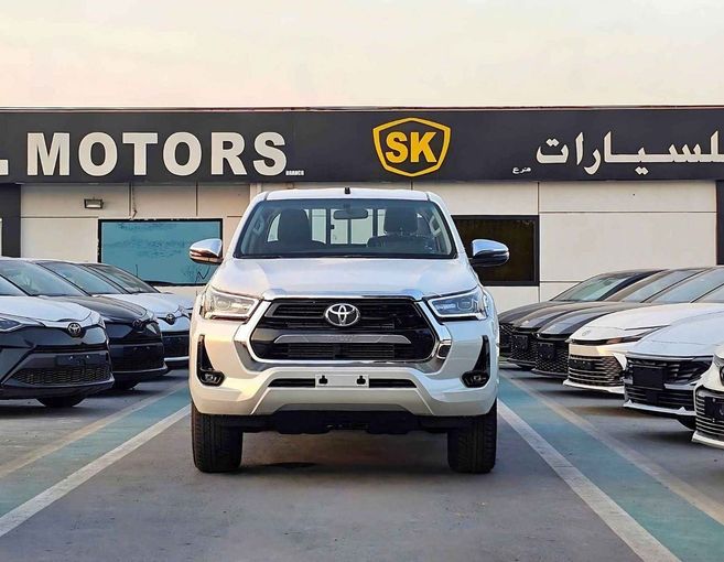 New Toyota Hilux VIII Facelift 2, 2.4 l, 2025 in Dubai by SK Motors, White color. GCC Specs | AUTO.AE