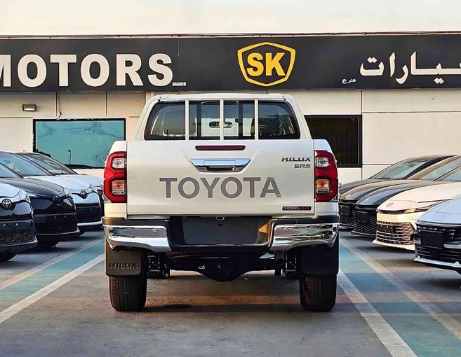 New Toyota Hilux VIII Facelift 2, 2.4 l, 2025 in Dubai by SK Motors, White color. GCC Specs | AUTO.AE