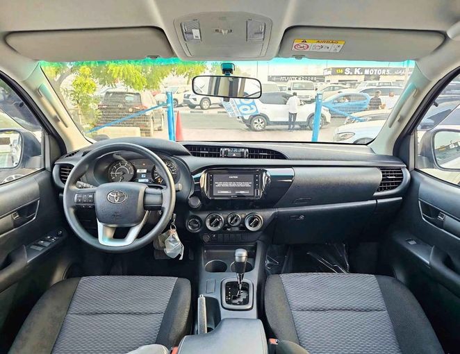 New Toyota Hilux VIII Facelift 2, 2.8 l, 2025 in Dubai by SK Motors, Silver color. GCC Specs | AUTO.AE