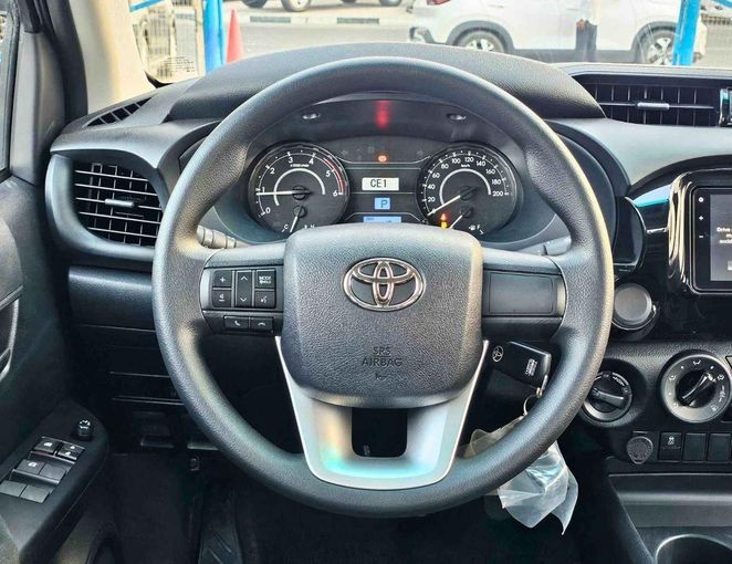 New Toyota Hilux VIII Facelift 2, 2.8 l, 2025 in Dubai by SK Motors, Silver color. GCC Specs | AUTO.AE