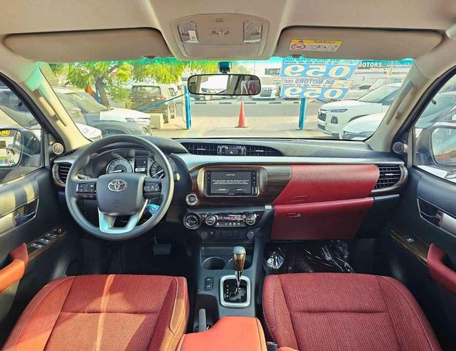 New Toyota Hilux VIII Facelift, 2.7 l, 2025 in Dubai by SK Motors, Black color. GCC Specs | AUTO.AE