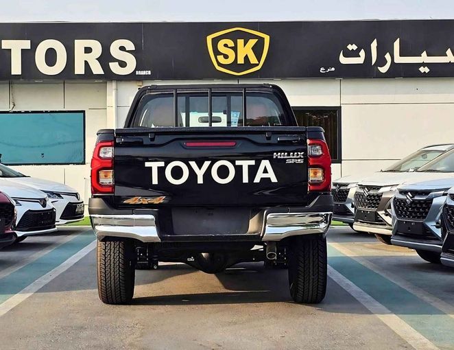 New Toyota Hilux VIII Facelift, 2.7 l, 2025 in Dubai by SK Motors, Black color. GCC Specs | AUTO.AE