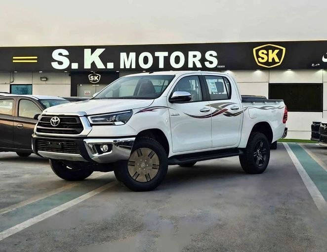 New Toyota Hilux VIII Facelift, 2.7 l, 2025 in Dubai by SK Motors, White color. GCC Specs | AUTO.AE