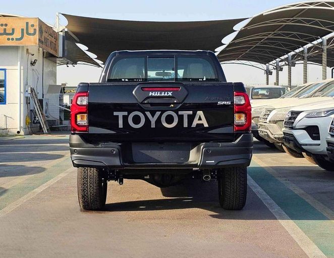 New Toyota Hilux VIII Facelift, 4.0 l, 2025 in Dubai by SK Motors, Black color. GCC Specs | AUTO.AE