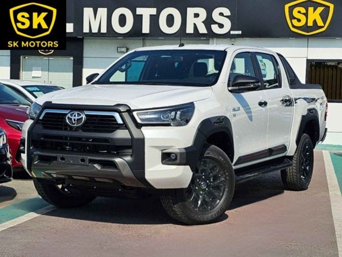 New Toyota Hilux VIII Facelift, 4.0 l, 2024 in Dubai by SK Motors, White color. GCC Specs | AUTO.AE