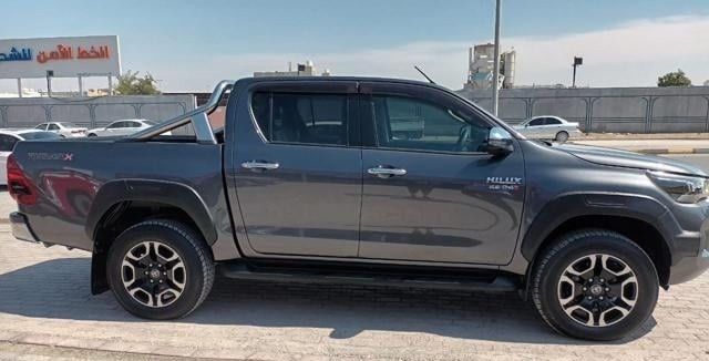 Подержанный Toyota Hilux VIII Рестайлинг, 2.8 л, 2021 в Дубае от Alhamd Motors Серый цвет. Other | AUTO.AE